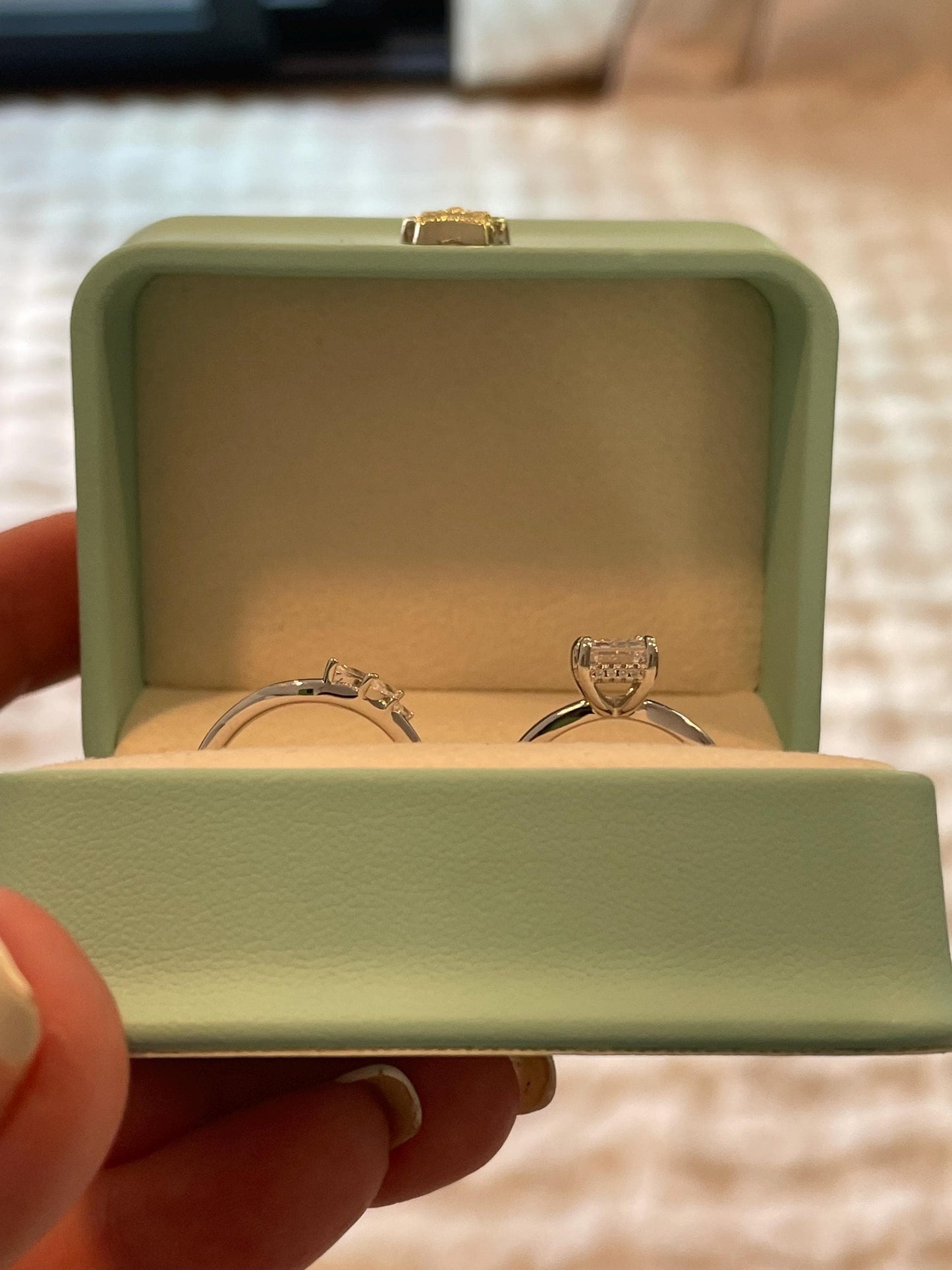 2 carat emerald cut moissanite engagement ring set. Sterling silver 925 bridal ring set with 2CT solitare with hidden halo and curved band.