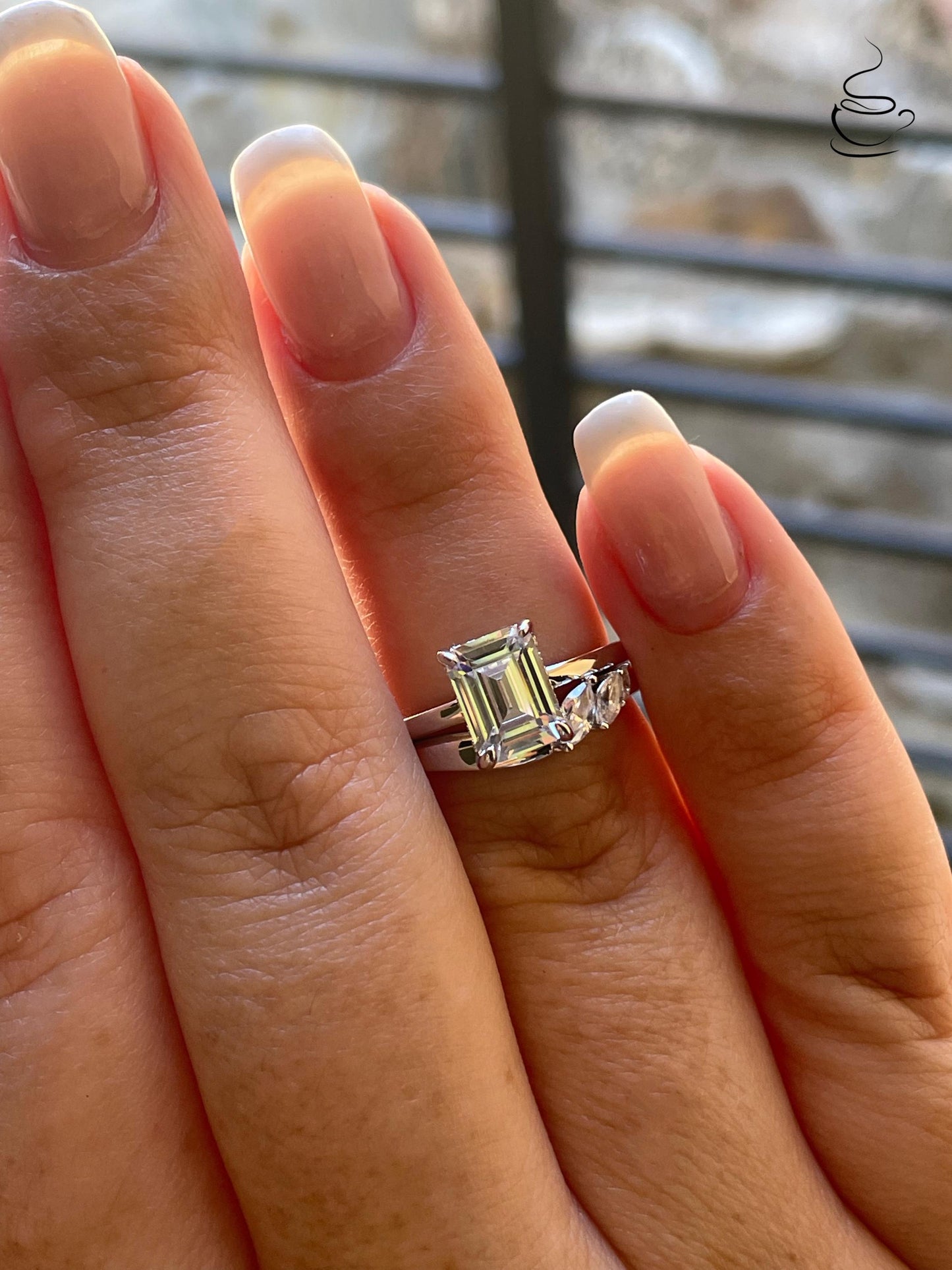 2 carat emerald cut moissanite engagement ring set. Sterling silver 925 bridal ring set with 2CT solitare with hidden halo and curved band.