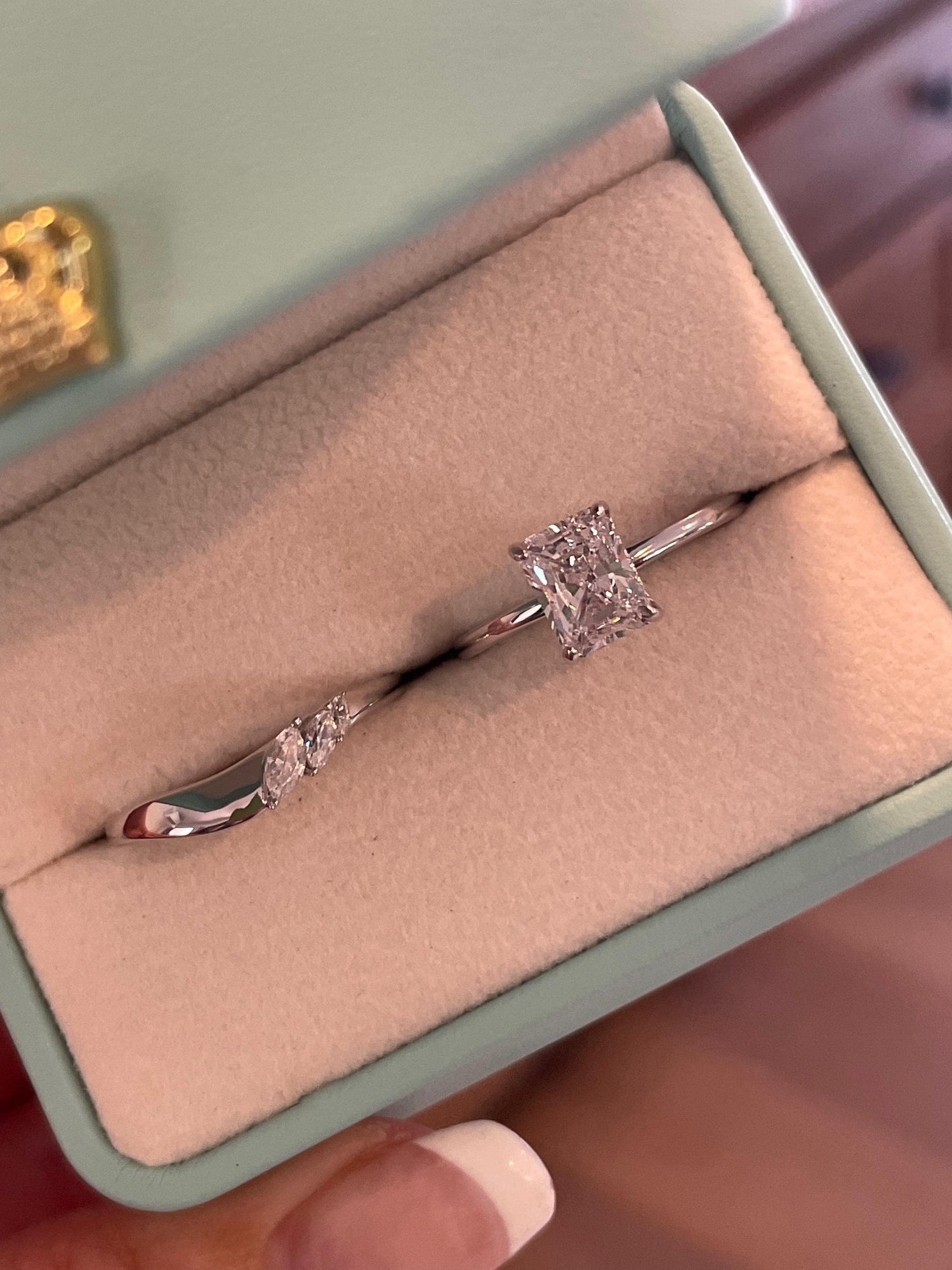 2 carat radiant cut moissanite engagement ring set. Sterling silver 925 bridal ring set with 2CT solitare with hidden halo and curved band.