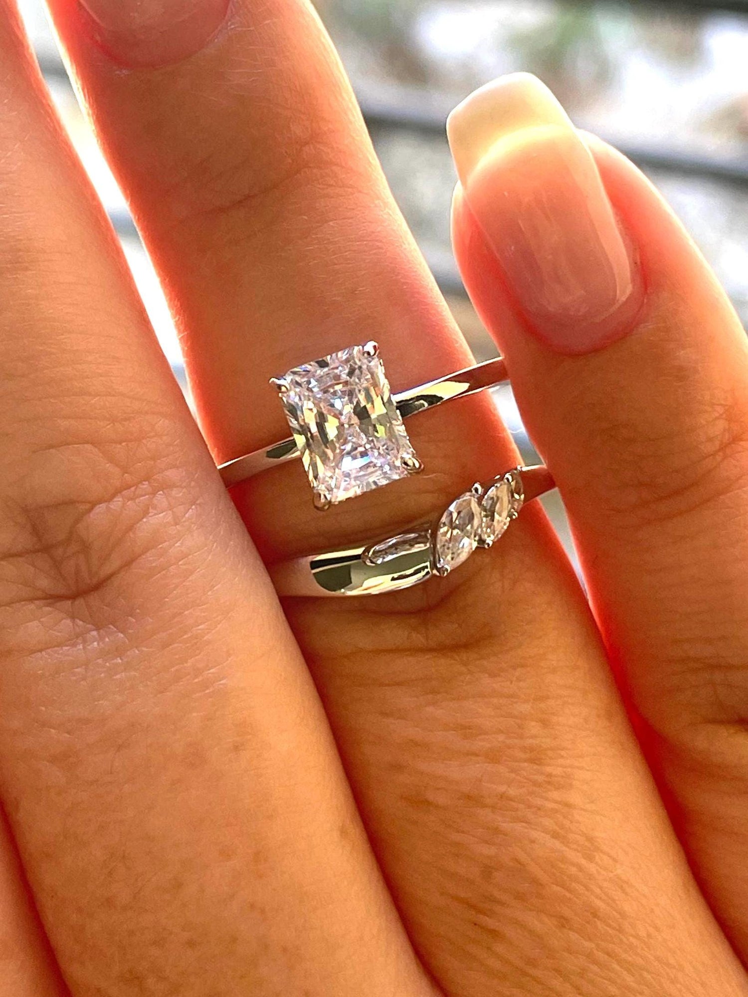 2 carat radiant cut moissanite engagement ring set. Sterling silver 925 bridal ring set with 2CT solitare with hidden halo and curved band.