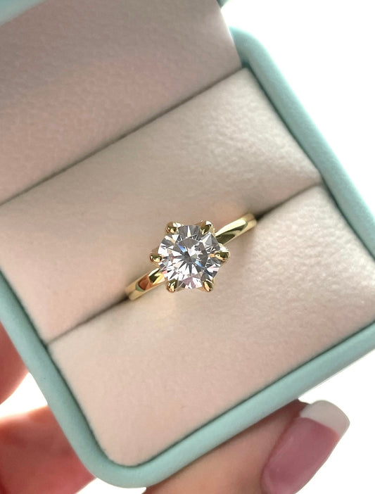 The Bella. Sterling Silver 925, yellow gold vermeil engagement ring with 2CT round brilliant cut simulated diamond.