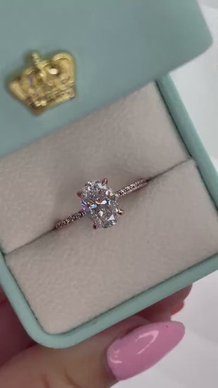 The Stella. Hidden Halo. Rose gold over Sterling Silver 925 engagement ring with 2.2CT oval cut the finest 6A CZ simulated diamonds