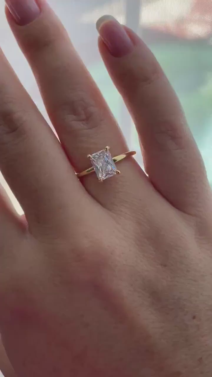 The Alessandra. 18K Yellow Gold Over Sterling Silver 925 Engagement Ring with the finest 2CT Radiant cut simulated diamond.