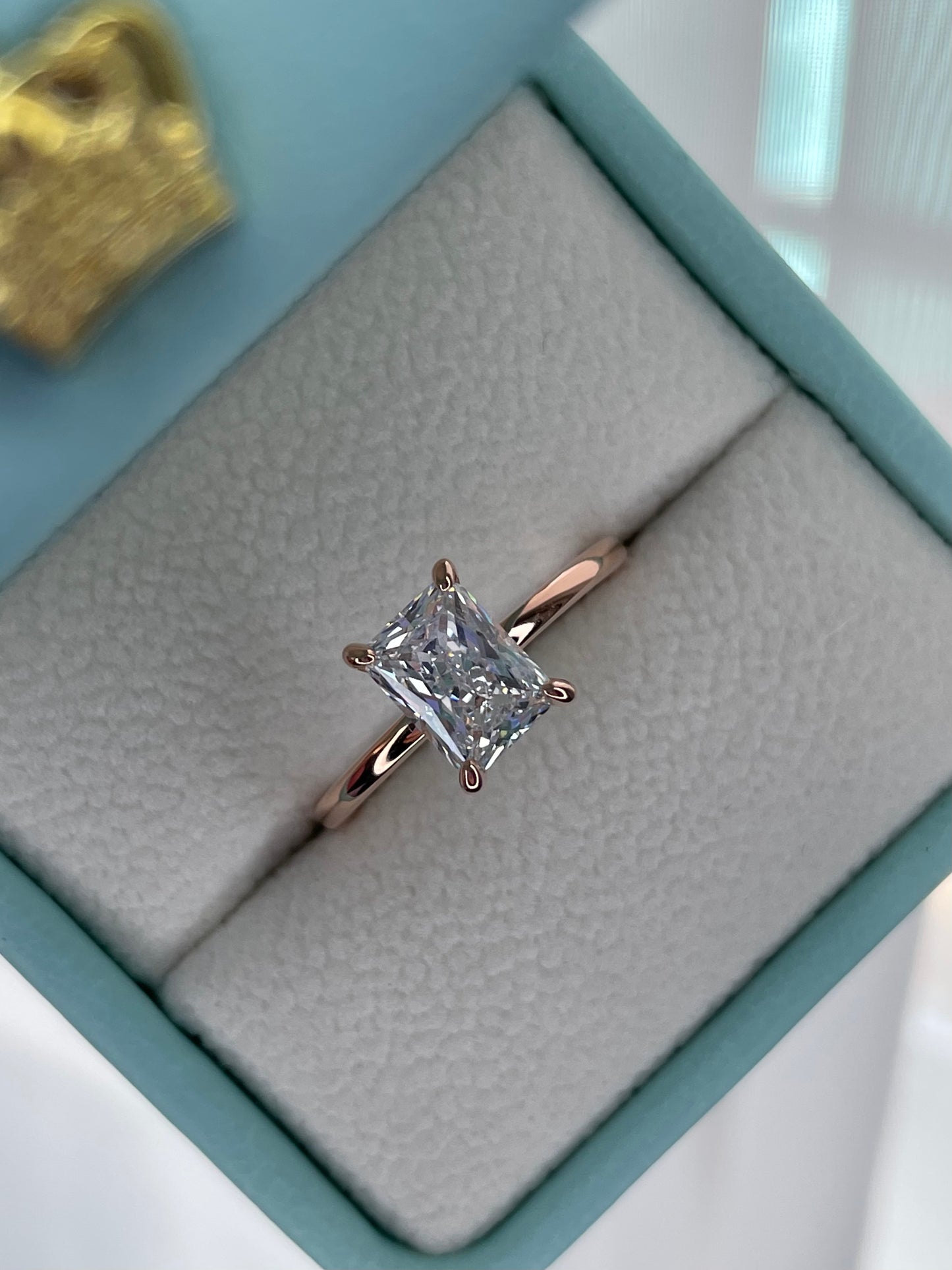 The Alessandra. Rose Gold Vermeil Engagement Ring with 2CT radiant Cut Simulated Diamond