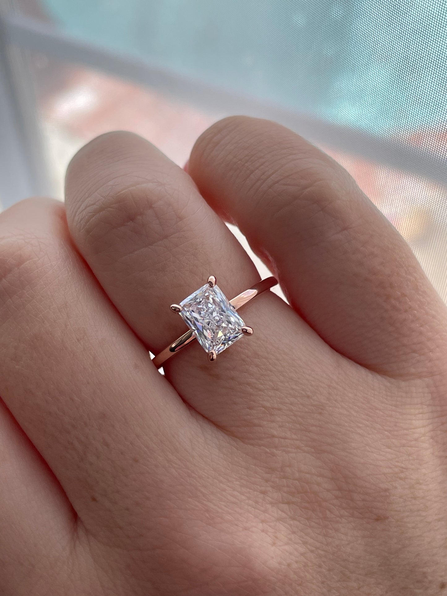 The Alessandra. Rose Gold Vermeil Engagement Ring with 2CT radiant Cut Simulated Diamond